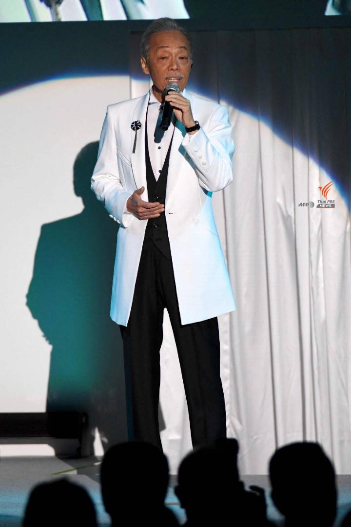 ชินจิ ทานิมูระ ขณะทำการแสดงที่โตเกียวเมื่อปี 2018 