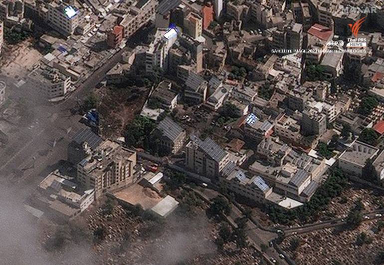 ภาพถ่ายดาวเทียมจาก Maxar Technologies แสดงให้เห็นความเสียหายจากการโจมตีโรงพยาบาล Ahli Arab และพื้นที่โดยรอบในกาซา 